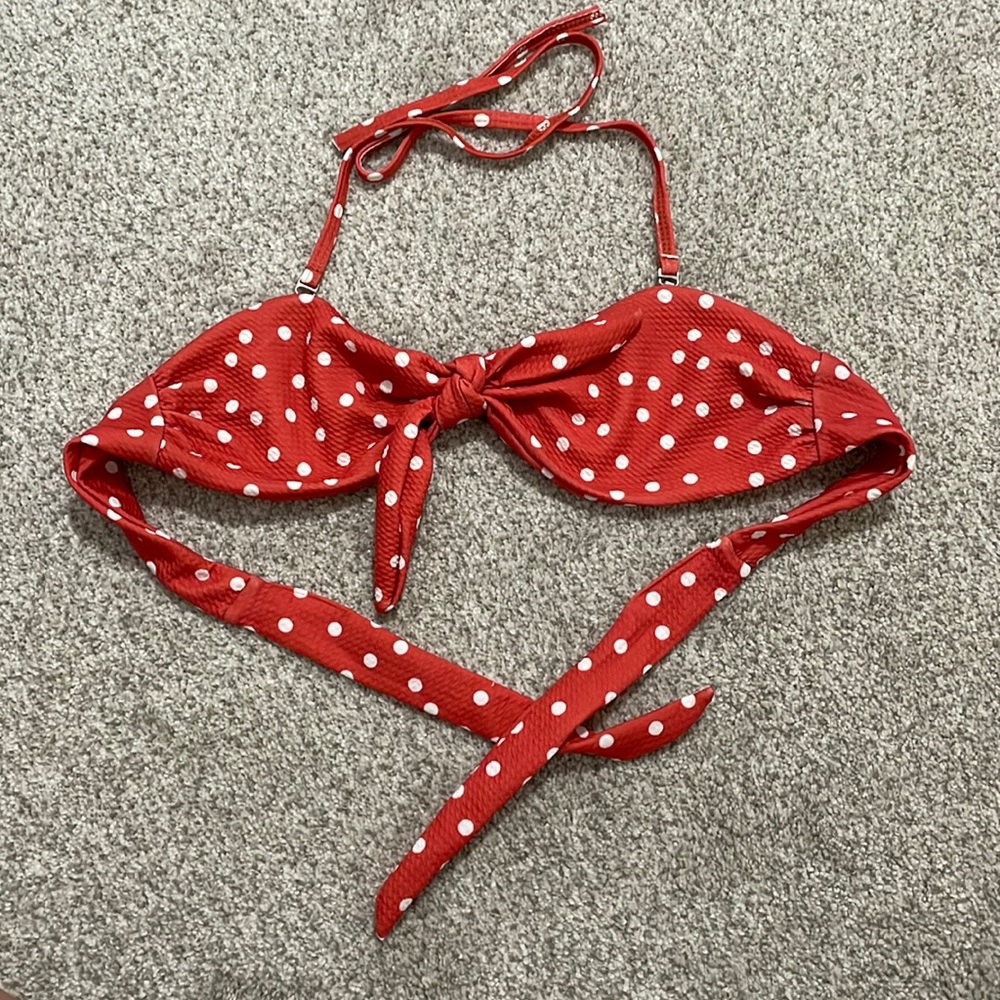 Red / orange polka dot bikini top.